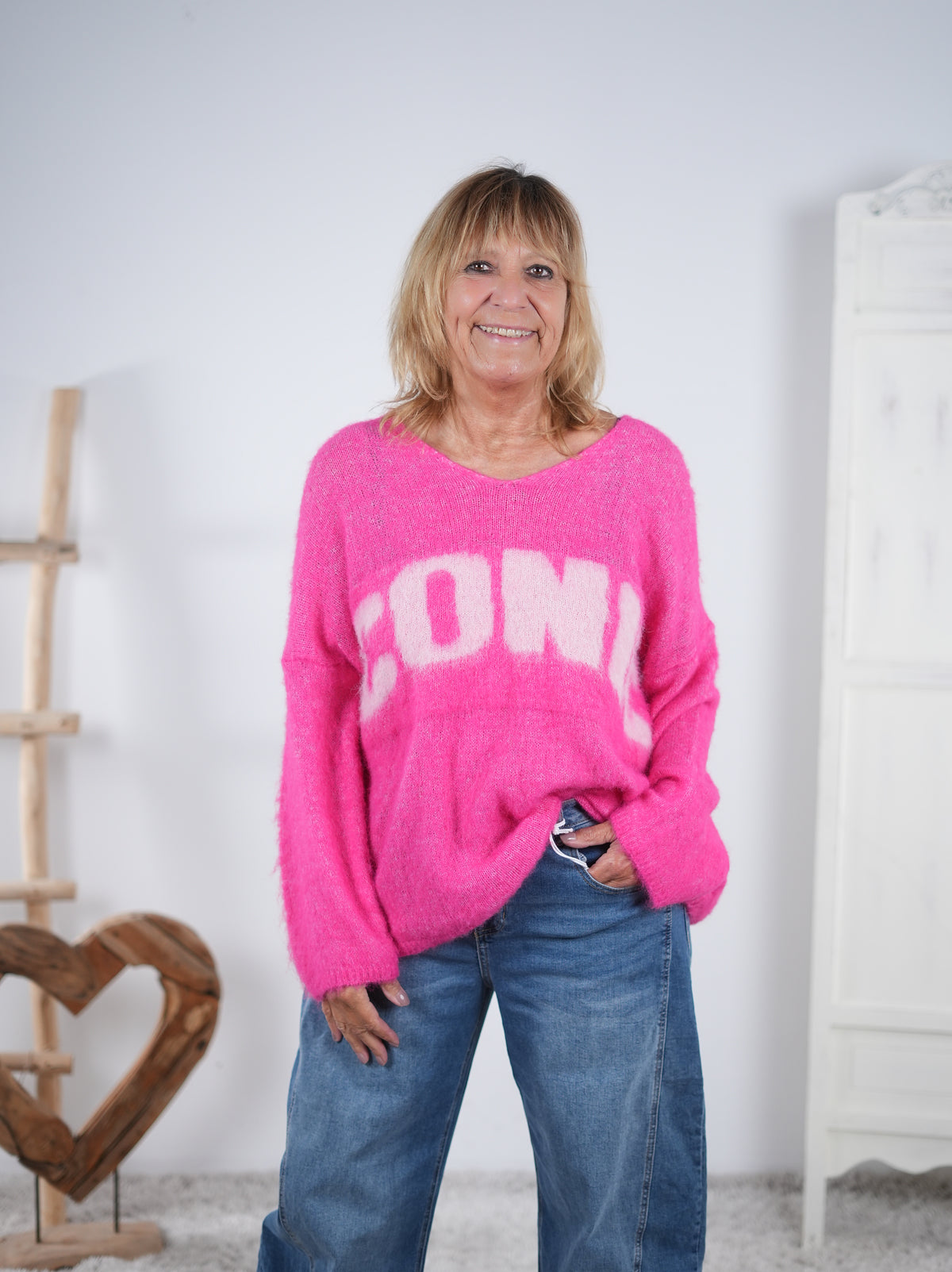 oversize Strickpulli mit Schriftzug im Vokuhila Schnitt Pink