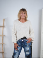 unifarbener Strickpullover mit V-Ausschnitt und Außennähten