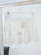 Blusenverlängerung aus Spitze Beige