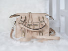 Lässige Crossbody Tasche mit Vintage-Details und Nieten Beige