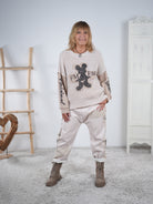 sportliche Baggy aus Kunstleder mit seitlichem Streifen Beige