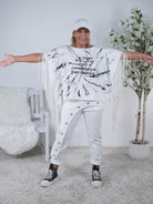 ausgefallener Poncho mit Fransen