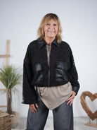 Kunstlederjacke mit Lochstickerei Schwarz