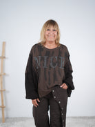 Lässiges oversize Sweaty mit Strickärmeln und großem Print