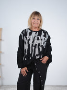 Lässiges oversize Sweaty mit Strickärmeln und großem Print