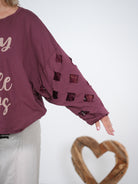 langarm Shirt Schriftzug und auffälligen Ärmeln