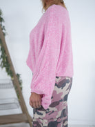 pinker Strickponcho mit Rundhalsausschnitt