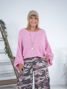 pinker Strickponcho mit Rundhalsausschnitt