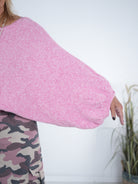 pinker Strickponcho mit Rundhalsausschnitt